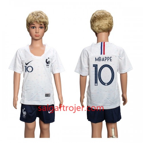 Frankrig Fodboldtrøjer Mbappe 10 Børn Udebanesæt VM 2018 Frankrig Fodboldtrøjer Mbappe 10 Børn Udebanesæt VM 2018